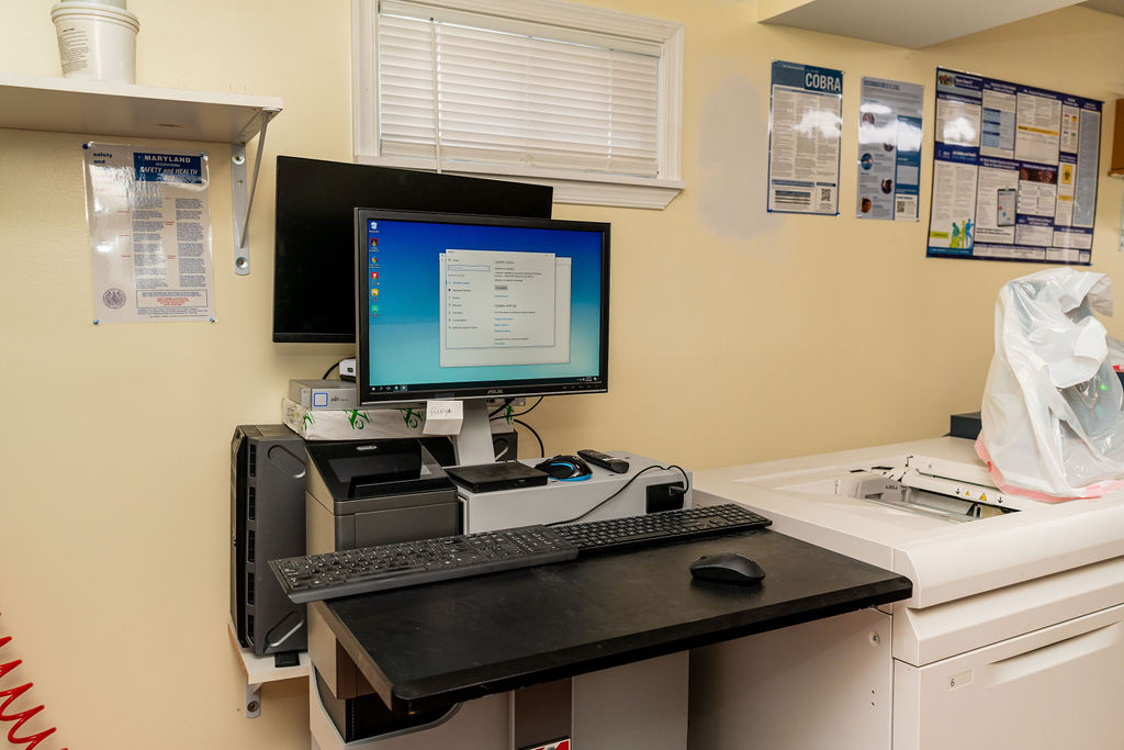 Graphic design workstation where Hilson Ink prepares artwork and proofs — Areas We Serve